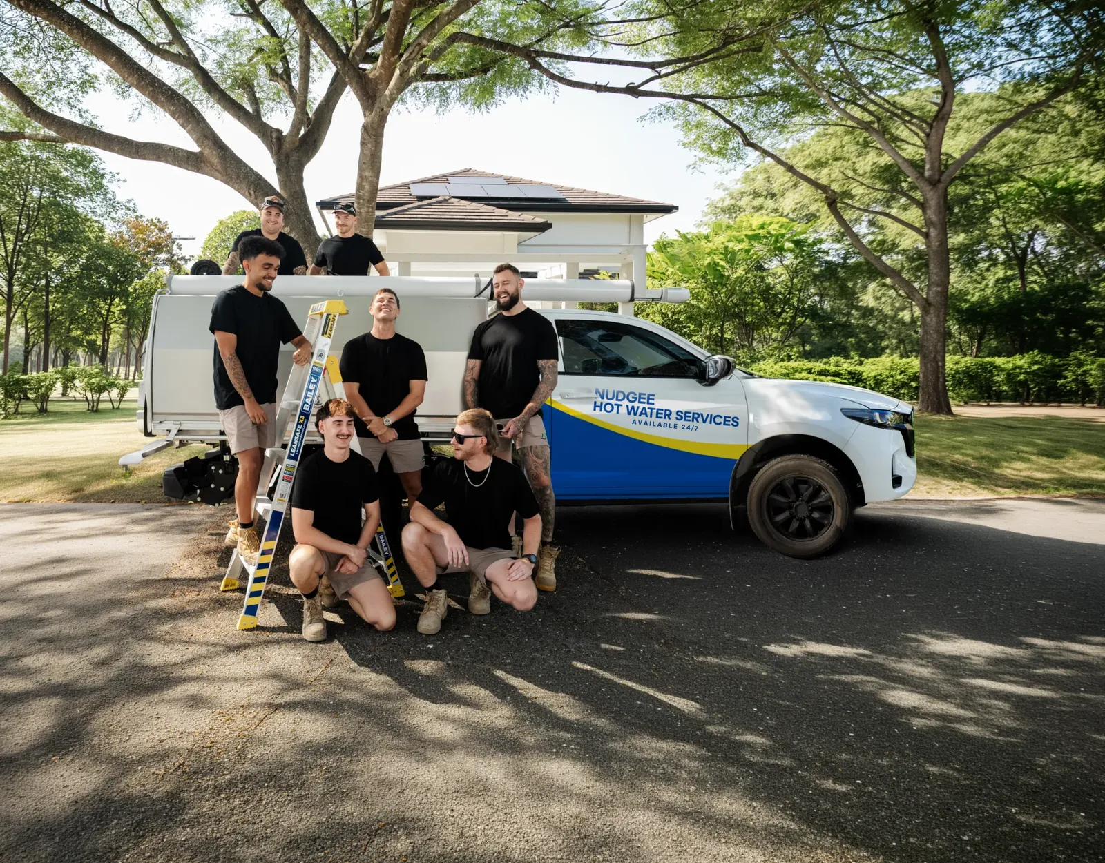 Nudgee Hot Water Services ute and team